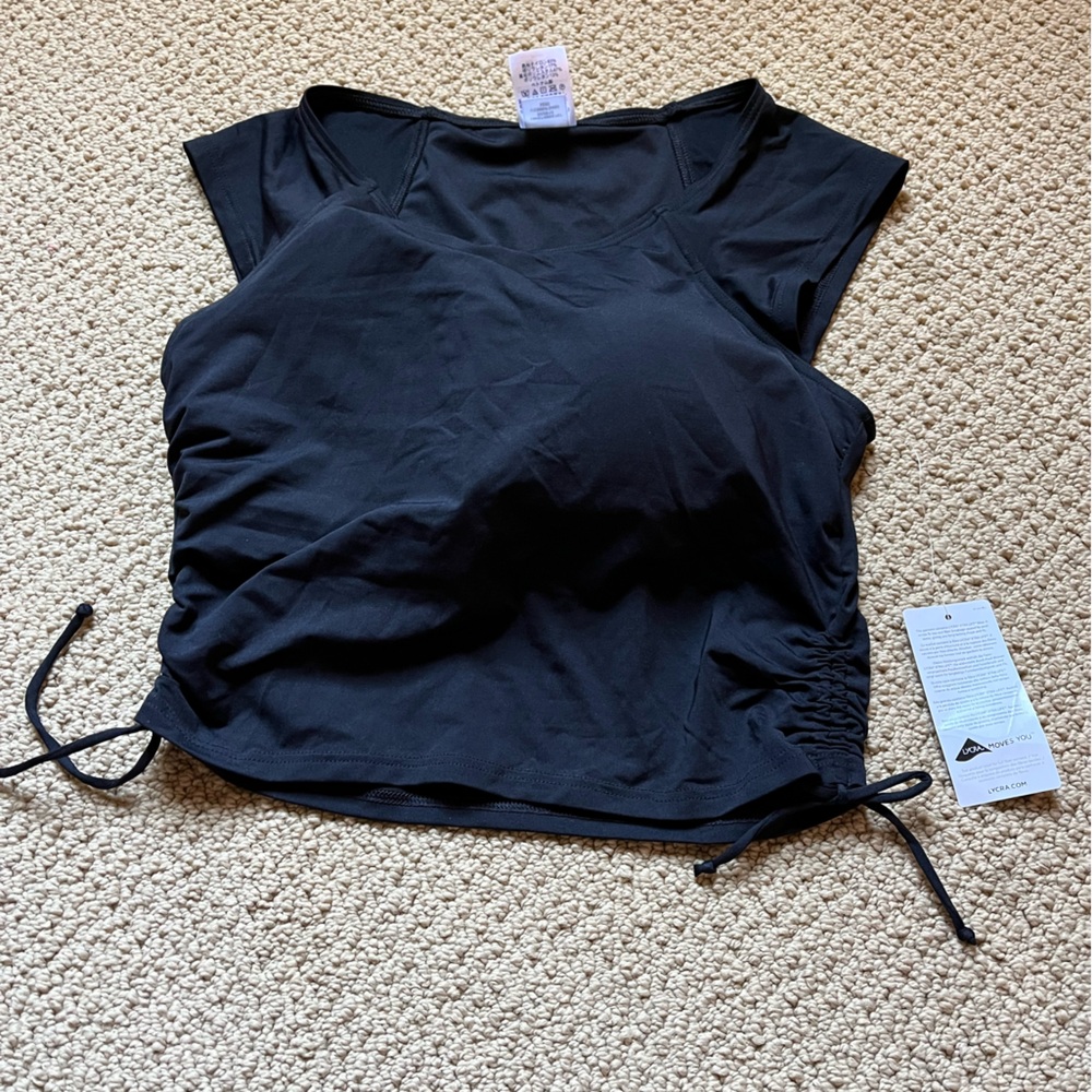 Lycra never been worn, with tags, brand new woman’s black tank top!